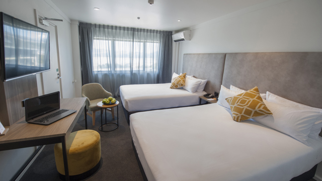 Deluxe Twin for 1-4 people (maximum 3 adults) with 2 Double Beds and an ensuite bathroom.
