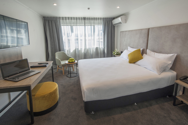Deluxe King for 1-3 people with 1 King Bed and an ensuite bathroom.